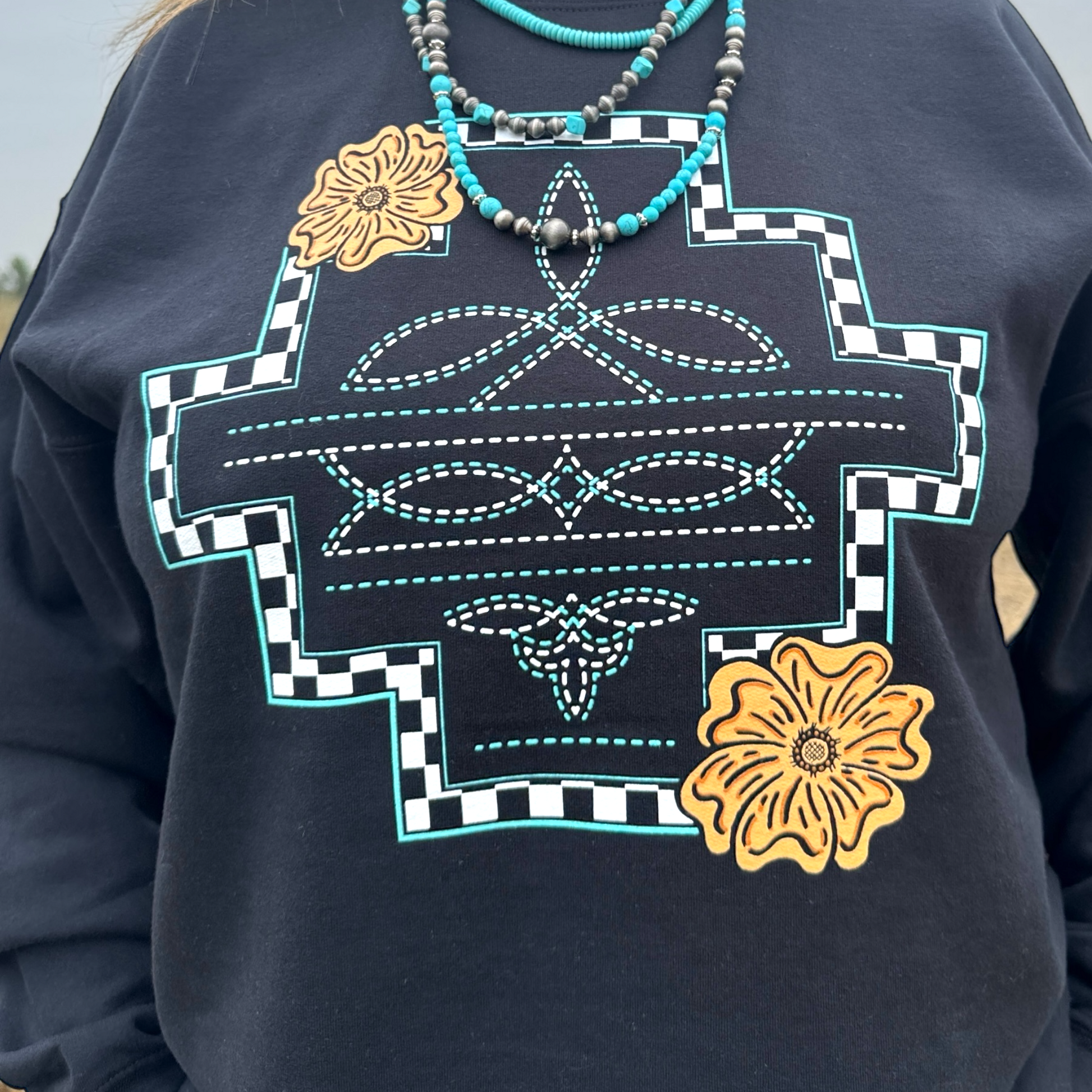 Close up of the design on the  Little Country Little Hood Sweatshirt