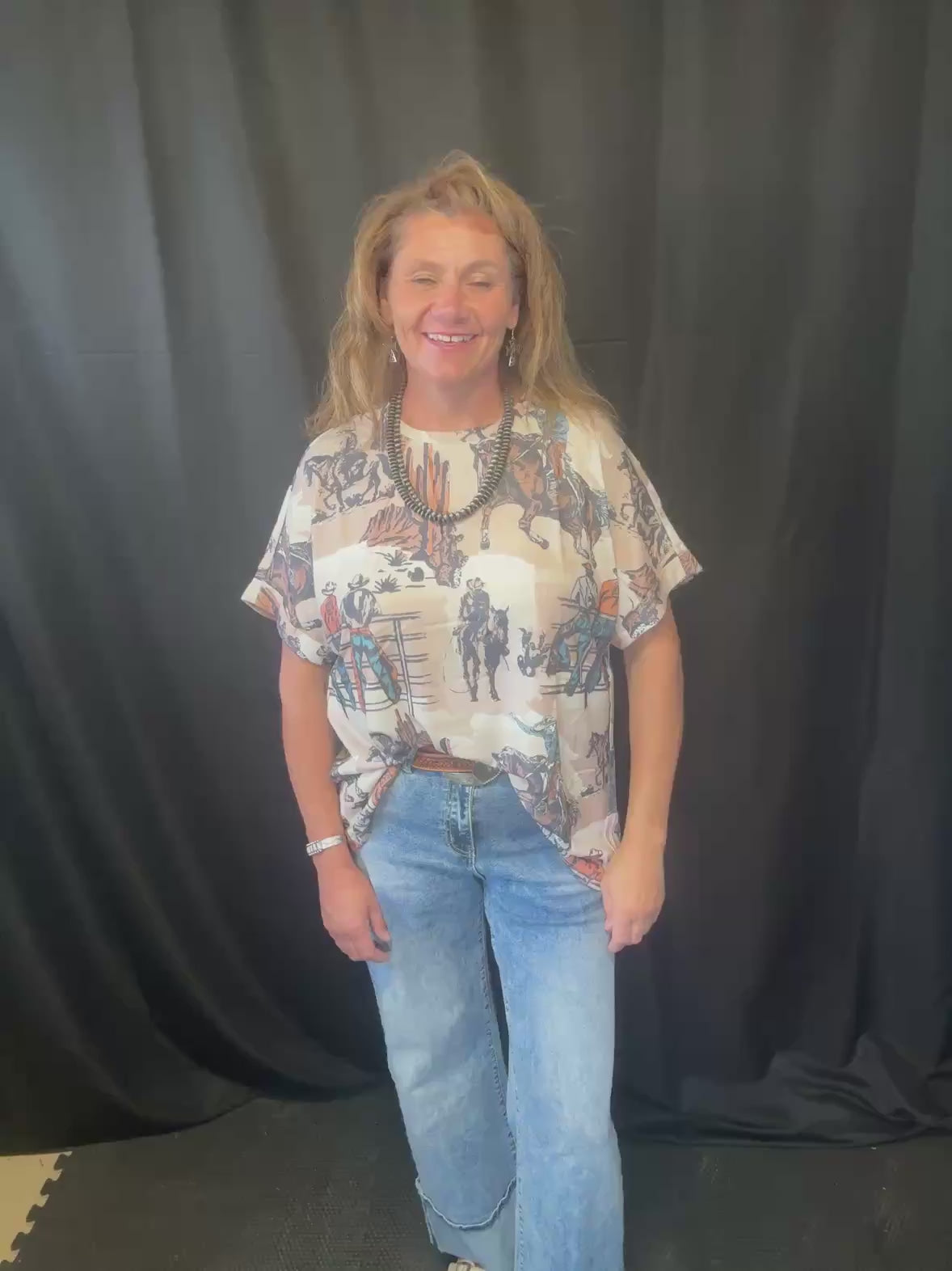video of the Dusty Cowboy tee describing the fit